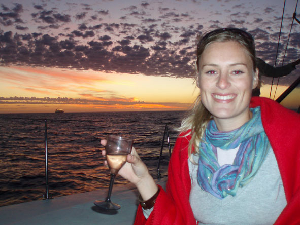 Kate Erskine - on a catamaran enjoying a beautiful Cape Town sunset